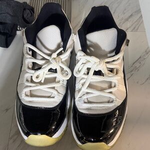 Jordan 11s mens Black and White Sneakers